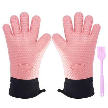 Pair of pink five-finger silicone oven gloves with a silicone basting brush