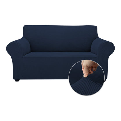 OCVES stretch sofa cover in Navy Blue on a 2 seater sofa